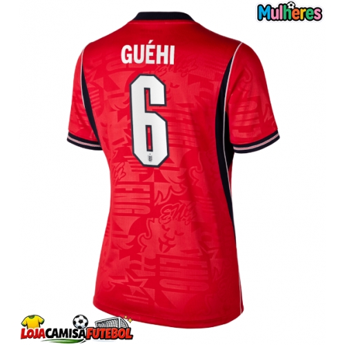 Camisa de Futebol Inglaterra Marc Guehi #6 Equipamento Secundário Mulheres Mundo 2026 Manga Curta